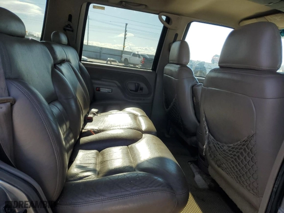 1999 Chevrolet Tahoe Z71 with VIN 1GNEK13R4XJ458295, listed as a Copart auction lot 47435675 with 211,422 mi miles and Salvage Title. Bid and sale history available at carsss.com. Image 11.