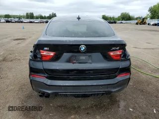 2015 BMW X4 xDrive35i with VIN 5UXXW5C55F0E87384, listed as a Copart auction lot 56299284 with 182,434 mi miles and Clean Title. Bid and sale history available at carsss.com. Image 6.