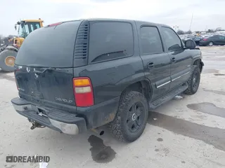 2003 Chevrolet Tahoe LS with VIN 1GNEC13V73R139530, listed as a IAAI auction lot 41598138 with 337,245 mi miles. Bid and sale history available at carsss.com. Image 4.