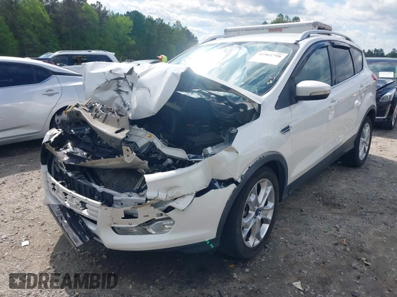2015 Ford Escape Titanium with VIN 1FMCU0J91FUB13810, listed as a IAAI auction lot 41961798 with 139,265 mi miles. Bid and sale history available at carsss.com. Image 18.