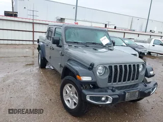 2023 Jeep Gladiator Sport S with VIN 1C6HJTAG3PL523140, listed as a IAAI auction lot 41719004 with 34,014 mi miles and . Bid and sale history available at DreamBid. Image 1.