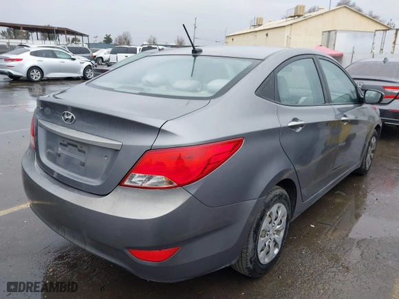 2015 Hyundai Accent GLS with VIN KMHCT4AE0FU927177, listed as a IAAI auction lot 41559026 with 181,703 mi miles. Bid and sale history available at carsss.com. Image 4.