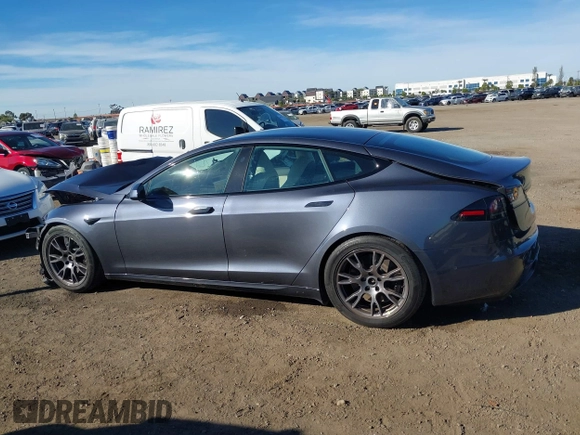 2023 Tesla Model S with VIN 5YJSA1E5XPF500341, listed as a IAAI auction lot 40756406 with 11,583 mi miles and . Bid and sale history available at DreamBid. Image 15.
