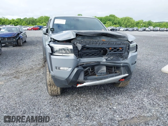 2022 Nissan Frontier SV z VIN 1N6ED1EJ0NN629038, wystawiony jako IAAI lot #41313351 z przebiegiem 98 234 mil mil oraz . Historia ofert i sprzedaży dostępna na DreamBid. Obrazek 6.