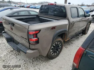 2024 Nissan Frontier PRO-4X with VIN 1N6ED1EK1RN616488, listed as a Copart auction lot 47004845 with 27,112 mi miles and Salvage Title. Bid and sale history available at carsss.com. Image 3.