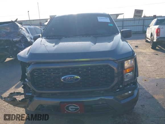 2023 Ford F-150 XL z VIN 1FTEW1CPXPKF85106, wystawiony jako IAAI lot #42818290 z przebiegiem 10 234 mil mil oraz . Historia ofert i sprzedaży dostępna na DreamBid. Obrazek 12.