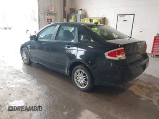 2009 Ford Focus SE with VIN 1FAHP35N69W128084, listed as a IAAI auction lot 42202678 with 290,358 mi miles. Bid and sale history available at carsss.com. Image 3.