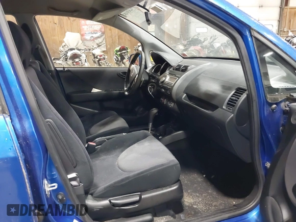 2007 Honda Fit Sport z VIN JHMGD38687S053880, wystawiony jako IAAI lot #42436181 z przebiegiem 124 076 mil mil oraz . Historia ofert i sprzedaży dostępna na DreamBid. Obrazek 5.