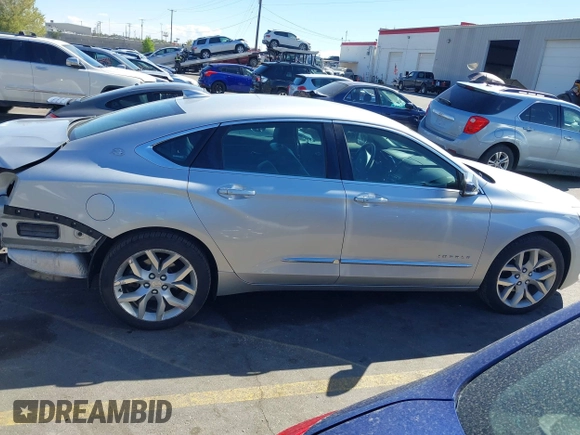 2015 Chevrolet Impala LTZ with VIN 2G1165S34F9101489, listed as a IAAI auction lot 42141525 with 149,037 mi miles and . Bid and sale history available at DreamBid. Image 14.