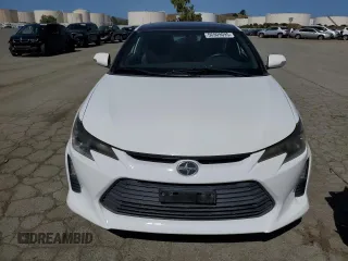 2014 Scion tC z VIN JTKJF5C71E3082375, wystawiony jako Copart lot #56909095 z przebiegiem 140 165 mil mil oraz Szkoda całkowita • Salvage title. Historia ofert i sprzedaży dostępna na DreamBid. Obrazek 5.