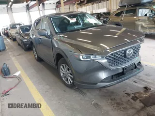 2023 Mazda CX-5 S Carbon Edition z VIN JM3KFBCM4P0247685, wystawiony jako IAAI lot #42137813 z przebiegiem 10 440 mil mil oraz . Historia ofert i sprzedaży dostępna na DreamBid. Obrazek 1.