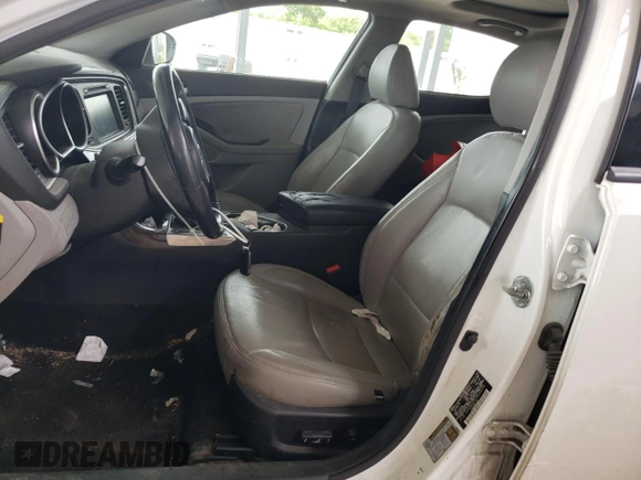 2015 Kia Optima EX z VIN 5XXGN4A75FG452374, wystawiony jako Copart lot #59928725 z przebiegiem 162 831 mil mil oraz Szkoda całkowita • Salvage title. Historia ofert i sprzedaży dostępna na DreamBid. Obrazek 7.