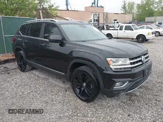 2019 Volkswagen Atlas SEL z VIN 1V2ER2CA2KC592691, wystawiony jako IAAI lot #42011478 z przebiegiem 57 628 mil mil oraz . Historia ofert i sprzedaży dostępna na DreamBid. Obrazek 1.