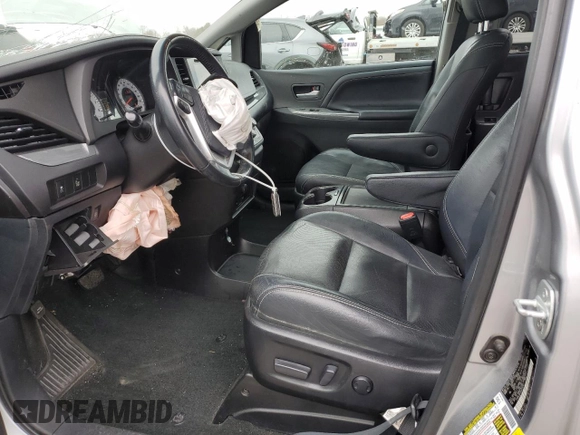 2016 Toyota Sienna SE with VIN 5TDXK3DC0GS725247, listed as a Copart auction lot 48266475 with 100,122 mi miles and Salvage title. Bid and sale history available at DreamBid. Image 7.