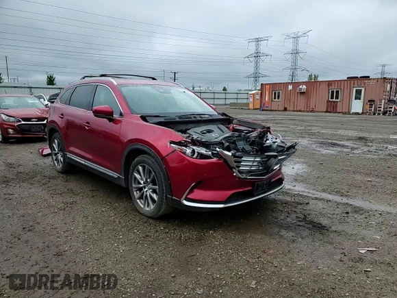 2018 Mazda CX-9 Grand Touring z VIN JM3TCBDYXJ0207231, wystawiony jako Copart lot #57911615 z przebiegiem 109 027 mil mil oraz Szkoda całkowita • Salvage title. Historia ofert i sprzedaży dostępna na DreamBid. Obrazek 14.