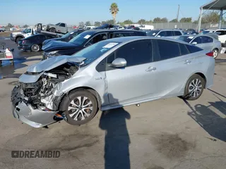 2022 Toyota Prius LE with VIN JTDKAMFP3N3209448, listed as a IAAI auction lot 40533784 with 116,436 mi miles and . Bid and sale history available at DreamBid. Image 2.