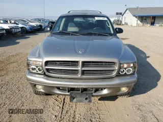 2001 Dodge Durango z VIN 1B4HS28Z71F516203, wystawiony jako Copart lot #75471444 z przebiegiem 226 560 mil mil oraz Czysty tytuł • Clean title. Historia ofert i sprzedaży dostępna na DreamBid. Obrazek 5.