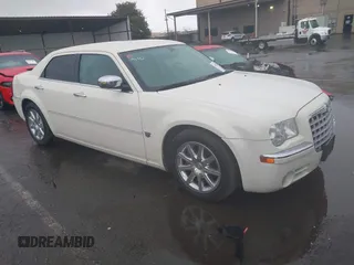 2007 Chrysler 300 C with VIN 2C3KA63H67H848601, listed as a IAAI auction lot 41798256 with 143,187 mi miles. Bid and sale history available at carsss.com. Image 1.