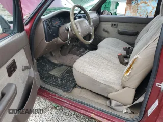 1999 Toyota Tacoma z VIN 4TANL42N4XZ435246, wystawiony jako Copart lot #56843025 z przebiegiem 197 295 mil mil oraz Szkoda całkowita • Salvage title. Historia ofert i sprzedaży dostępna na DreamBid. Obrazek 8.
