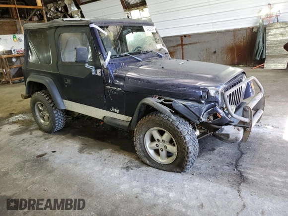 1998 Jeep Wrangler SE with VIN 1J4FY29P4WP792159, listed as a Copart auction lot 73400054 with 0 mi miles and Salvage Title. Bid and sale history available at carsss.com. Image 4.
