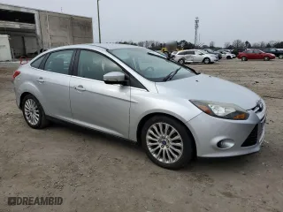 2012 Ford Focus Titanium with VIN 1FAHP3J21CL293447, listed as a Copart auction lot 43963615 with 151,448 mi miles and Salvage Title. Bid and sale history available at carsss.com. Image 4.