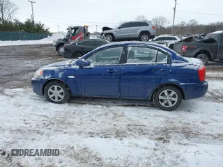 2007 Hyundai Accent GLS with VIN KMHCN46C17U103319, listed as a IAAI auction lot 41620787 with 65,291 mi miles. Bid and sale history available at carsss.com. Image 14.