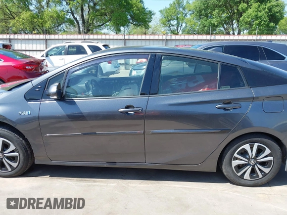 2018 Toyota Prius Plus with VIN JTDKARFP0J3101473, listed as a IAAI auction lot 41857956 with 110,020 mi miles and . Bid and sale history available at DreamBid. Image 15.