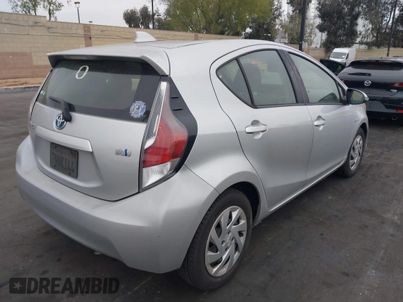 2015 Toyota Prius One with VIN JTDKDTB34F1092819, listed as a IAAI auction lot 42067212 with 126,394 mi miles and . Bid and sale history available at carsss.com. Image 4.