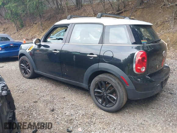 2012 MINI Countryman with VIN WMWZB3C5XCWM30191, listed as a IAAI auction lot 42435291 with 103,254 mi miles and . Bid and sale history available at DreamBid. Image 3.