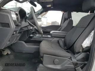 2023 Ford F-150 XL with VIN 1FTEW1CP4PKF86851, listed as a Copart auction lot 50611185 with 15,773 mi miles and Salvage Title. Bid and sale history available at DreamBid. Image 7.