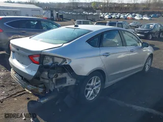 2016 Ford Fusion SE with VIN 1FA6P0H76G5132058, listed as a IAAI auction lot 42033056 with 220,841 mi miles. Bid and sale history available at carsss.com. Image 4.