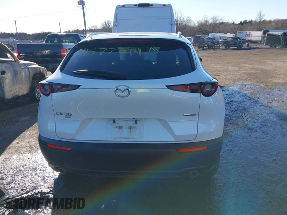 2022 Mazda CX-30 S Select z VIN 3MVDMBBL8NM448787, wystawiony jako IAAI lot #41577914 z przebiegiem 64 552 mil mil oraz . Historia ofert i sprzedaży dostępna na DreamBid. Obrazek 17.