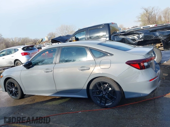 2025 Honda Civic Sport with VIN 2HGFE2F55SH529311, listed as a IAAI auction lot 41898987 with 2,873 mi miles and . Bid and sale history available at DreamBid. Image 14.