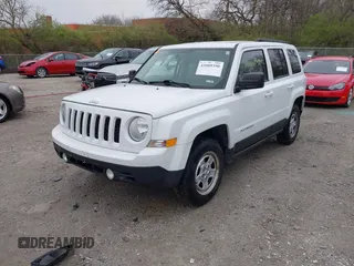 2014 Jeep Patriot Sport with VIN 1C4NJRBB1ED744101, listed as a IAAI auction lot 42009390 with 180,214 mi miles. Bid and sale history available at carsss.com. Image 19.