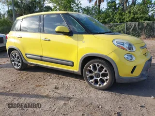 2014 FIAT 500L Trekking with VIN ZFBCFADH9EZ023686, listed as a IAAI auction lot 41714657 with 57,290 mi miles and . Bid and sale history available at DreamBid. Image 1.