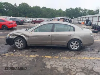 2002 Nissan Altima SL z VIN 1N4AL11D92C294136, wystawiony jako IAAI lot #42342860 z przebiegiem 220 080 mil mil oraz . Historia ofert i sprzedaży dostępna na DreamBid. Obrazek 14.
