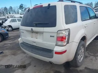 2011 Mercury Mariner z VIN 4M2CN8BG2BKJ01534, wystawiony jako IAAI lot #41832400 z przebiegiem 251 916 mil mil oraz . Historia ofert i sprzedaży dostępna na DreamBid. Obrazek 6.
