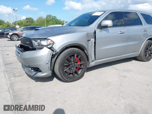 2018 Dodge Durango SRT with VIN 1C4SDJGJ6JC366644, listed as a IAAI auction lot 41906182 with 54,490 mi miles and . Bid and sale history available at DreamBid. Image 2.
