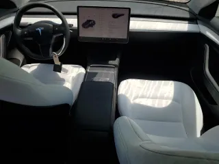 2023 Tesla Model 3 z VIN 5YJ3E1EA3PF645825, wystawiony jako Copart lot #57907795 z przebiegiem 18 810 mil mil oraz Szkoda całkowita • Salvage title. Historia ofert i sprzedaży dostępna na DreamBid. Obrazek 8.