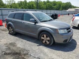 2012 Dodge Journey SXT with VIN 3C4PDDBG3CT170994, listed as a Copart auction lot 56558175 with 137,724 mi miles and Clean title. Bid and sale history available at DreamBid. Image 4.