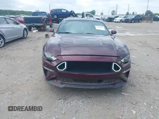 2018 Ford Mustang GT with VIN 1FA6P8CF3J5165619, listed as a IAAI auction lot 42169392 with 77,733 mi miles and . Bid and sale history available at DreamBid. Image 12.