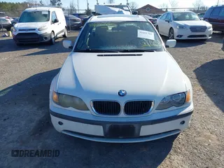 2002 BMW 3 Series 325i with VIN WBAET37492NG77657, listed as a IAAI auction lot 41691705 with 163,700 mi miles. Bid and sale history available at carsss.com. Image 6.