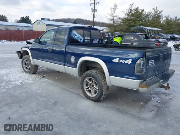 2004 Dodge Dakota SLT with VIN 1D7HG42N74S665198, listed as a IAAI auction lot 41477799 with 213,175 mi miles. Bid and sale history available at carsss.com. Image 3.