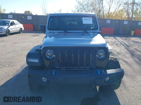 2023 Jeep Wrangler z VIN 1C4JJXN62PW628429, wystawiony jako IAAI lot #40861135 z przebiegiem 33 923 mil mil oraz . Historia ofert i sprzedaży dostępna na DreamBid. Obrazek 12.