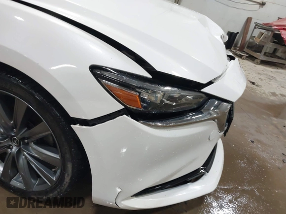 2019 Mazda 6 Grand Touring with VIN JM1GL1TYXK1505439, listed as a IAAI auction lot 41672678 with 52,990 mi miles and . Bid and sale history available at carsss.com. Image 19.