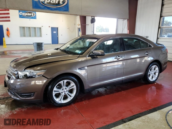 2015 Ford Taurus SEL with VIN 1FAHP2E94FG157022, listed as a Copart auction lot 74569614 with 133,223 mi miles and Salvage Title. Bid and sale history available at DreamBid. Image 1.