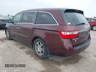 2012 Honda Odyssey EX-L with VIN 5FNRL5H61CB108301, listed as a IAAI auction lot 41939536 with 225,476 mi miles and . Bid and sale history available at DreamBid. Image 3.