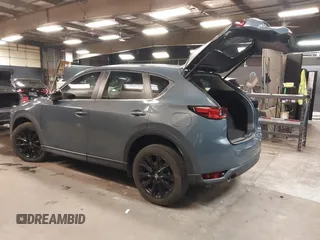 2021 Mazda CX-5 Touring with VIN JM3KFBCM5M0394707, listed as a IAAI auction lot 41887973 with 44,670 mi miles. Bid and sale history available at carsss.com. Image 3.