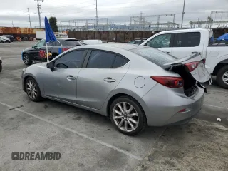 2014 Mazda 3 S Touring with VIN JM1BM1V31E1107453, listed as a Copart auction lot 48769215 with 145,346 mi miles and Salvage Title. Bid and sale history available at DreamBid. Image 2.