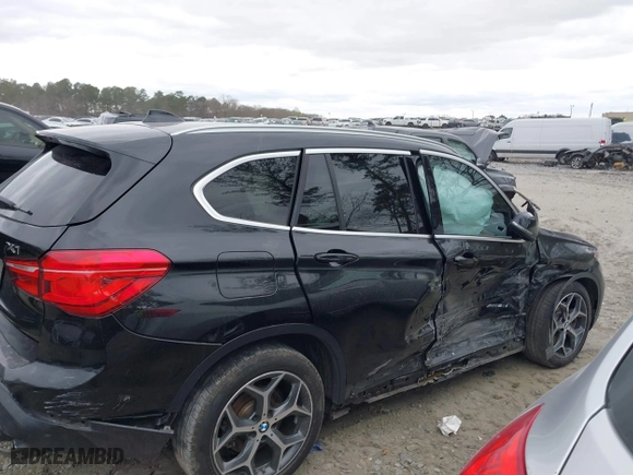2018 BMW X1 xDrive28i with VIN WBXHT3C34J5K21576, listed as a IAAI auction lot 41822390 with 69,645 mi miles. Bid and sale history available at carsss.com. Image 13.